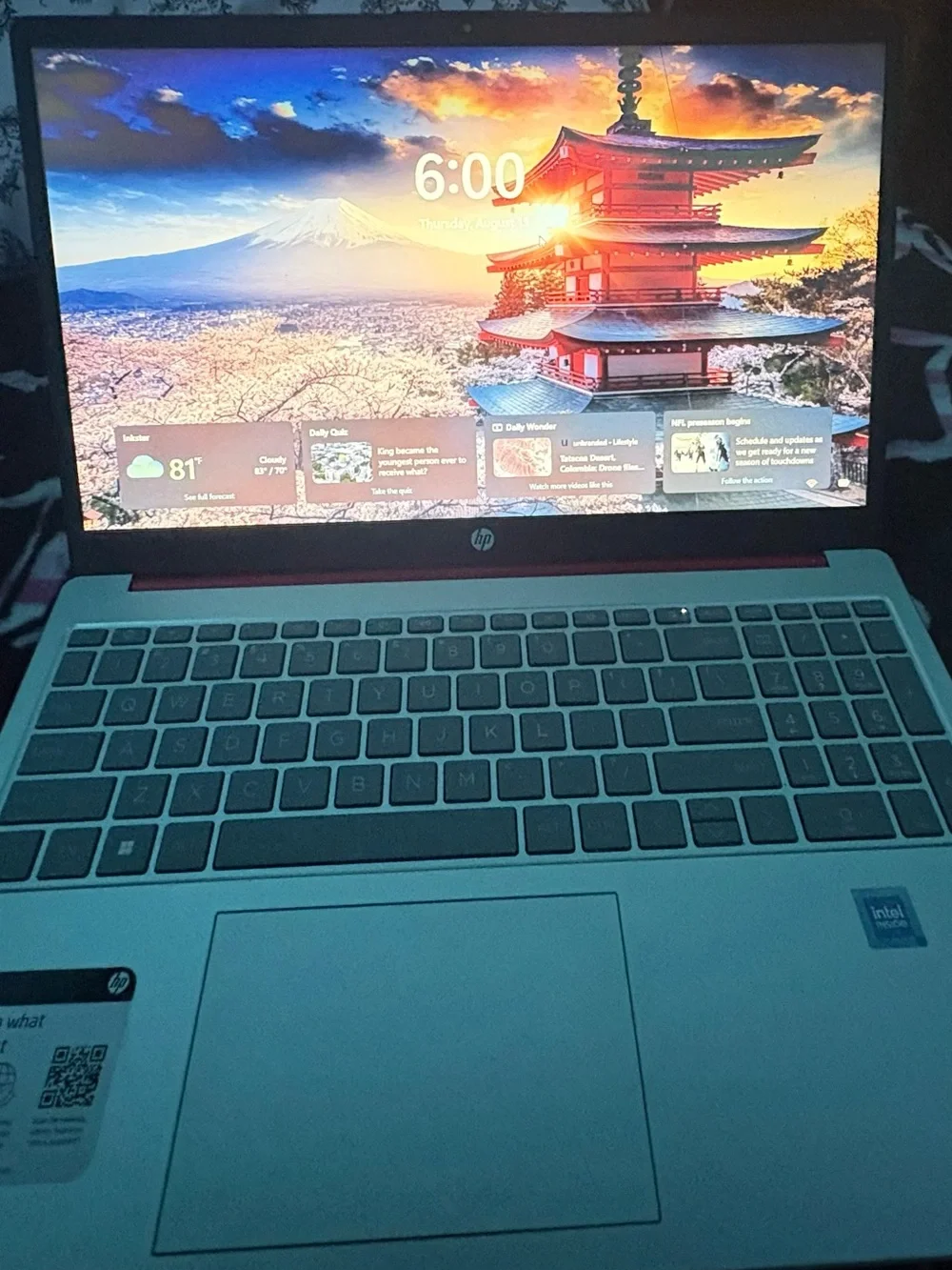 HP Red Laptop with Silver HP Logo